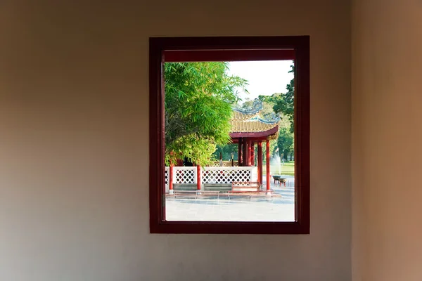 stock image View out of a window to the park in the Summerpalace