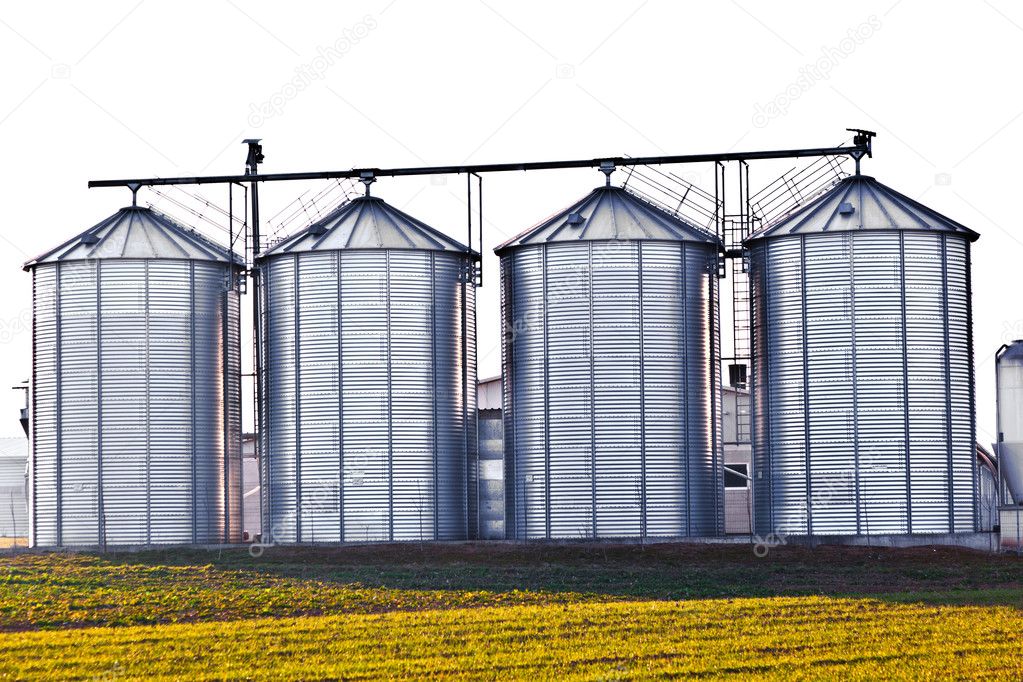 Silver silos in the field