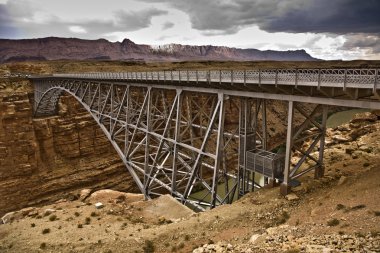 Old Navajo Bridge spanning the Colorado at Marble Canyon clipart