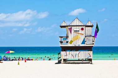 Wooden bay watch hut at the beach clipart