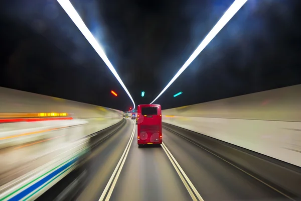 Beautiful red english bus in a tunnel in Hongkong