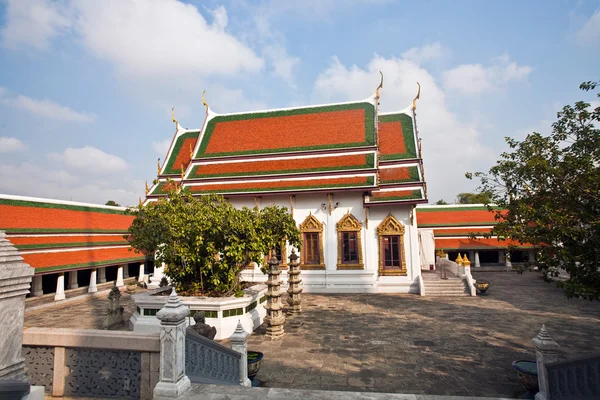 stock image Famous temple Phra Sri Ratana Chedi covered with foil gold in th