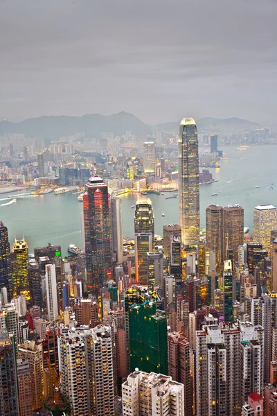 View from the peak over Victoria to Kowloon in the early evening — Stock Photo, Image