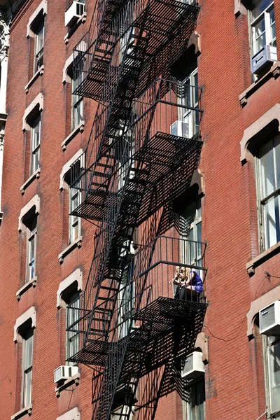 Fire escape at an old downtow house — Stock Photo, Image