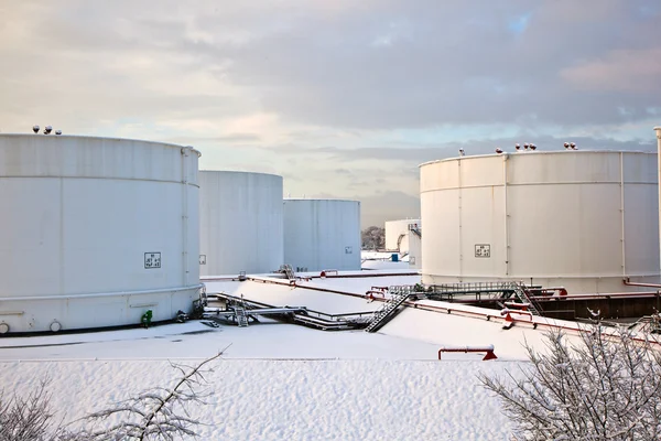White tanks in tank farm with snow in winter — Stock Photo, Image