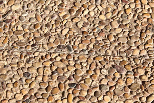 Pattern of stones in concrete — Stock Photo, Image