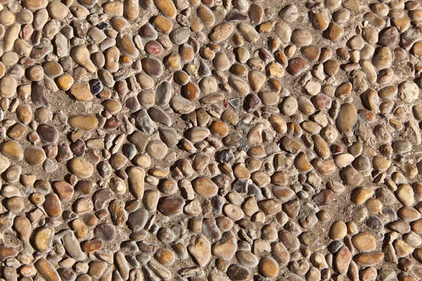 Pattern of stones in concrete — Stock Photo, Image