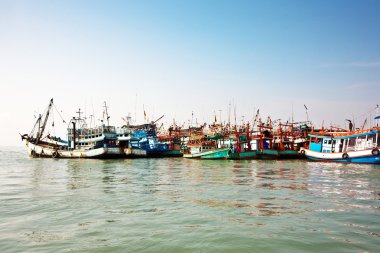 Fisherboats in the harbor in Koh Samet, Thailand clipart