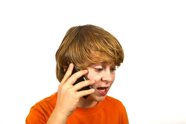 少年は、携帯電話を使用してください。 — ストック写真