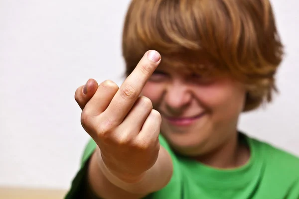 Boy showing his finger — Stock Photo, Image