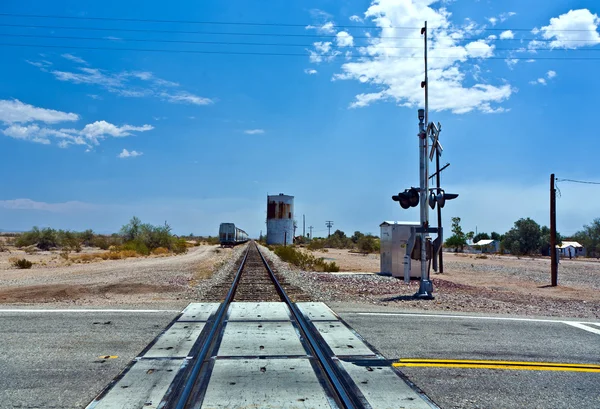 Railroad crossing at route 95 near the village Vidal — Stock Photo, Image