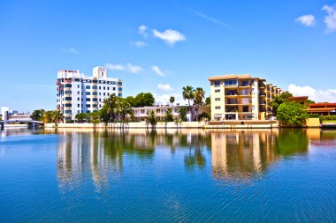 Houses at the canal in south Miami clipart