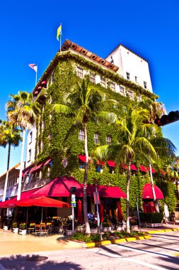 Old typical building in art deco style in South Miami with climb clipart