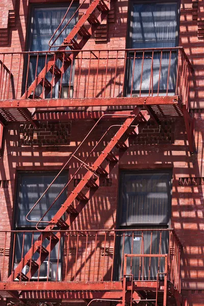 Fire ladder at old houses — Stock Photo, Image