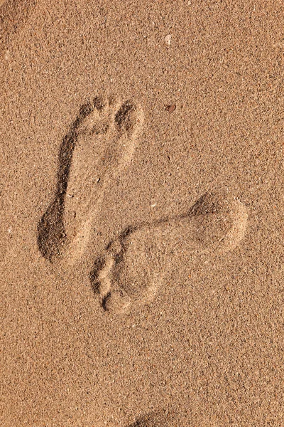Stopy člověka na pláži — Stock fotografie