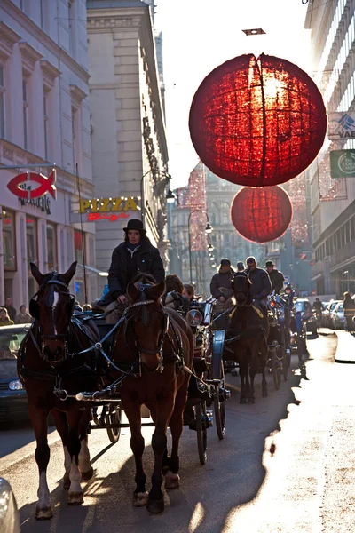 Streets are decorated with red christmas bauble ornaments — Stock Photo, Image