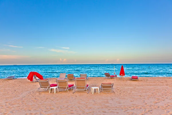 stock image Divan beds in sunset light at the beach