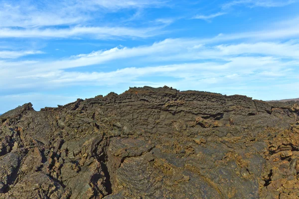 Stenar av vulkaniska flöde ger en vacker struktur — Stockfoto
