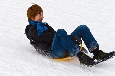 Children are sledding down the hill in snow, white winter clipart