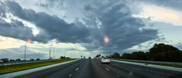 stock image Driving car in the evening on the Highway