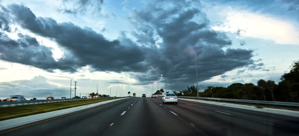 Stock image Driving car in the evening on the Highway