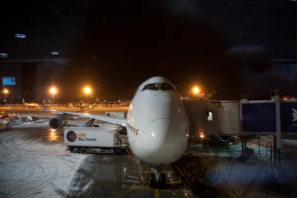 Stock image Aircraft at the finger in the airport