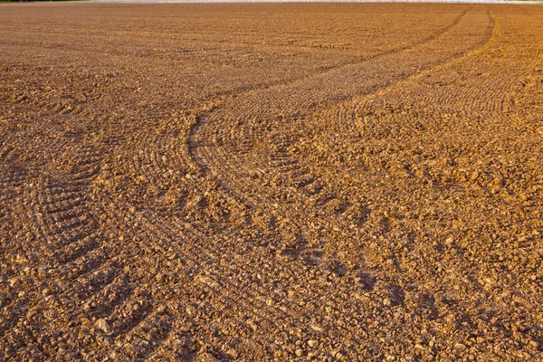 Mark of tire on field — Stock Photo, Image