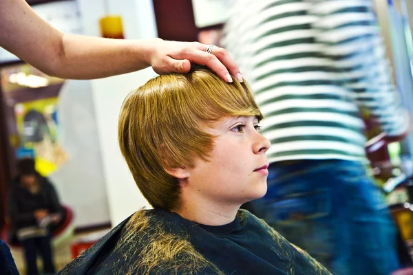 Young boy at the hairdresser — Stock Photo, Image