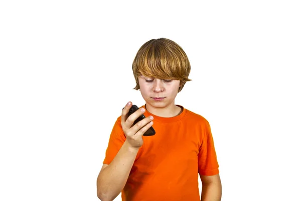 Boy está usando el móvil —  Fotos de Stock