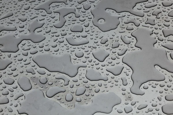 Water op zilveren metal — Stockfoto