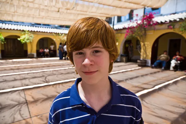 Cute boy in the old Olvera mission — Stock Photo, Image