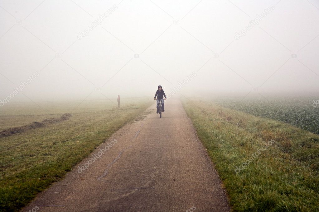 Young boy with mountain bike on tour