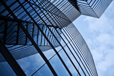 Glas front of the Uniqa tower in vienna with sky clipart