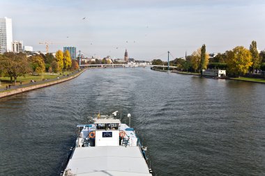 Freight ship on river Main clipart