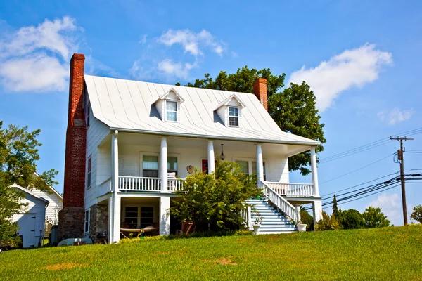 Old traditional farm house with typical balcony — Stock Photo, Image