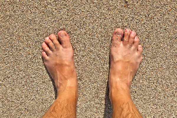 Ноги на пляже — стоковое фото