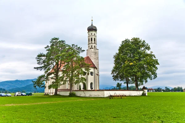 Typical bavarian or austrian landscape with a chape — Stock Photo, Image