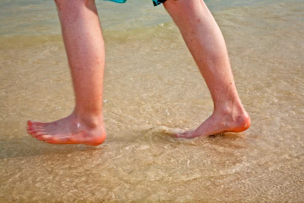 Futó láb a tengerparton — Stock Fotó