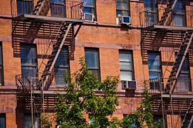 Fire ladder at old houses clipart