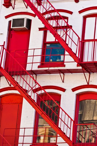 stock image Fire ladder at old houses downtown in New York