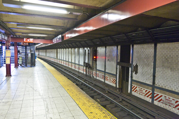 Train arrives in the underground station in New York