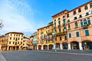 Romantic Market place at old town Bassano del Grappa in early m clipart