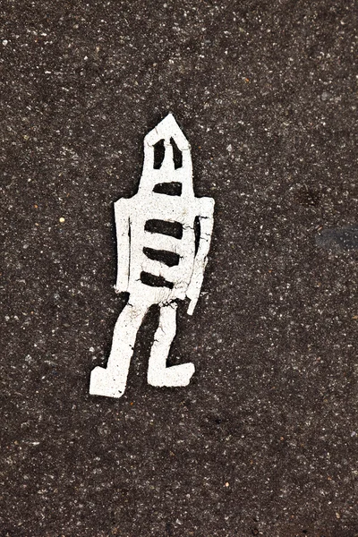 Symbol for man painted on asphalt — Stock Photo, Image