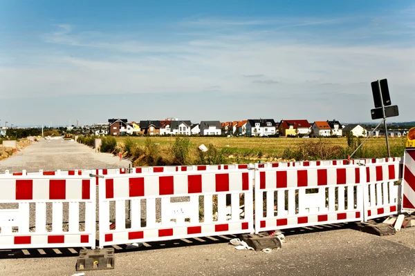 Hoarding in a housing area under construction — Stock Photo, Image