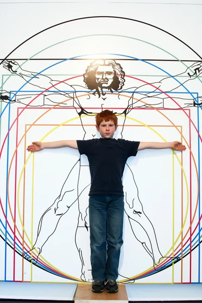 stock image Boy imitates Leonardo da Vincis ideal man