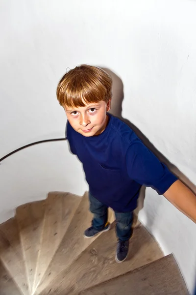 stock image Boy climbing stairs of a tower