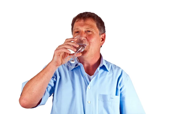 Törstig man dricker ur ett glas vin — Stockfoto