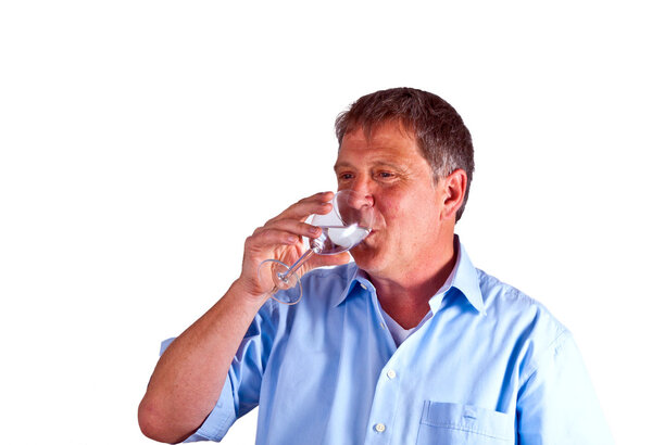 Thirsty man drinking out of a wine glass