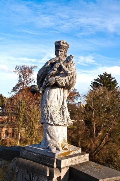 A püspök egy kereszt, a Jézus Krisztus-szobor — Stock Fotó
