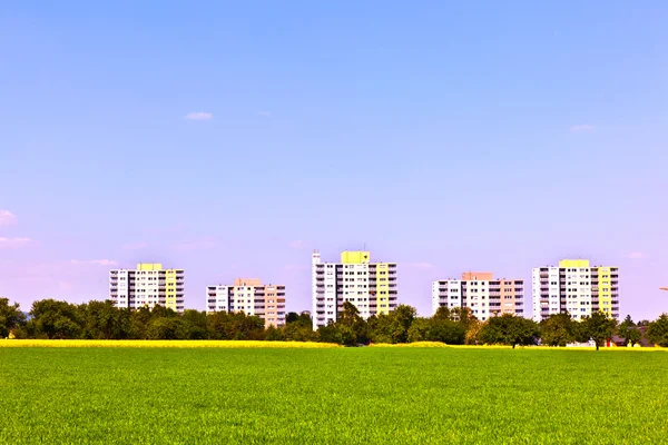 Housing area in rural landscape with fields — Stock Photo, Image